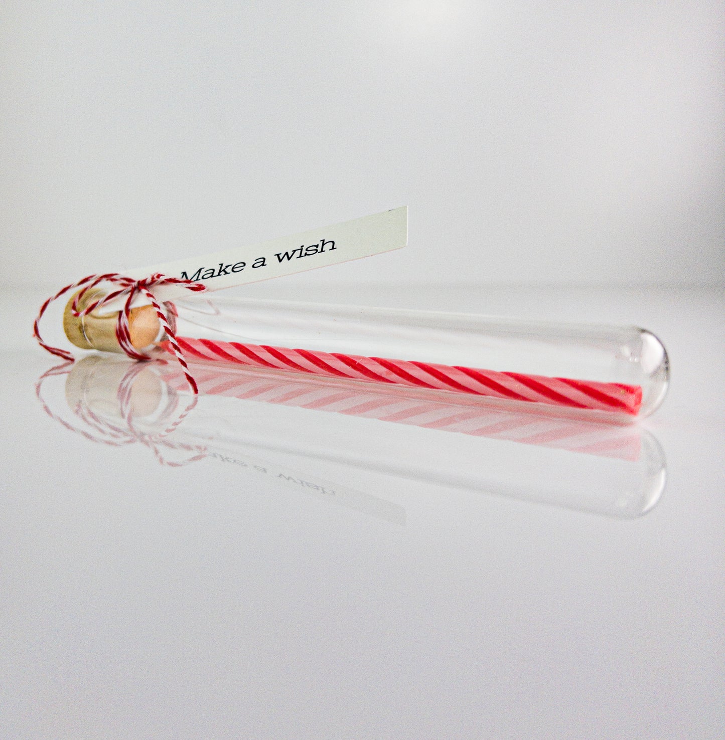 Extra long birthday candle in a test tube