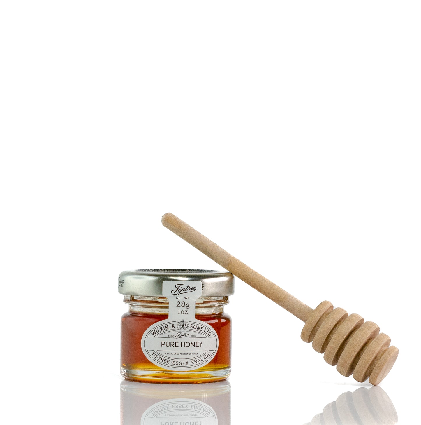 Mini jar of honey and wood honey dipper